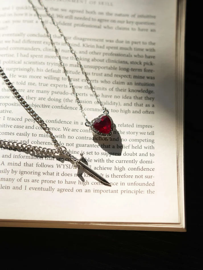 Silver plated heart and sword couple necklace